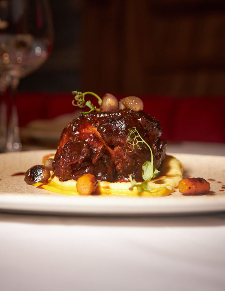 Gourmet sushi platter and steak served at The Library Lagos fine dining